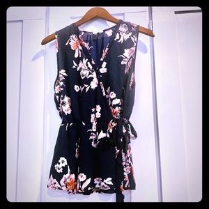 Sienna Sky sleeveless faux wrap top